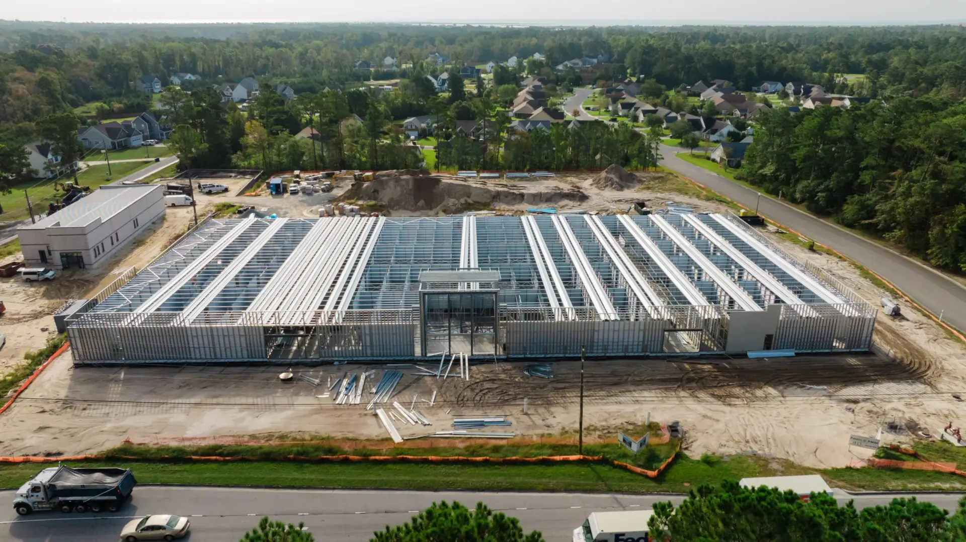 Single-story storage building undergoing installation.